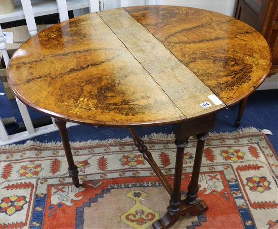 A Victorian walnut Sutherland table, W.90cm